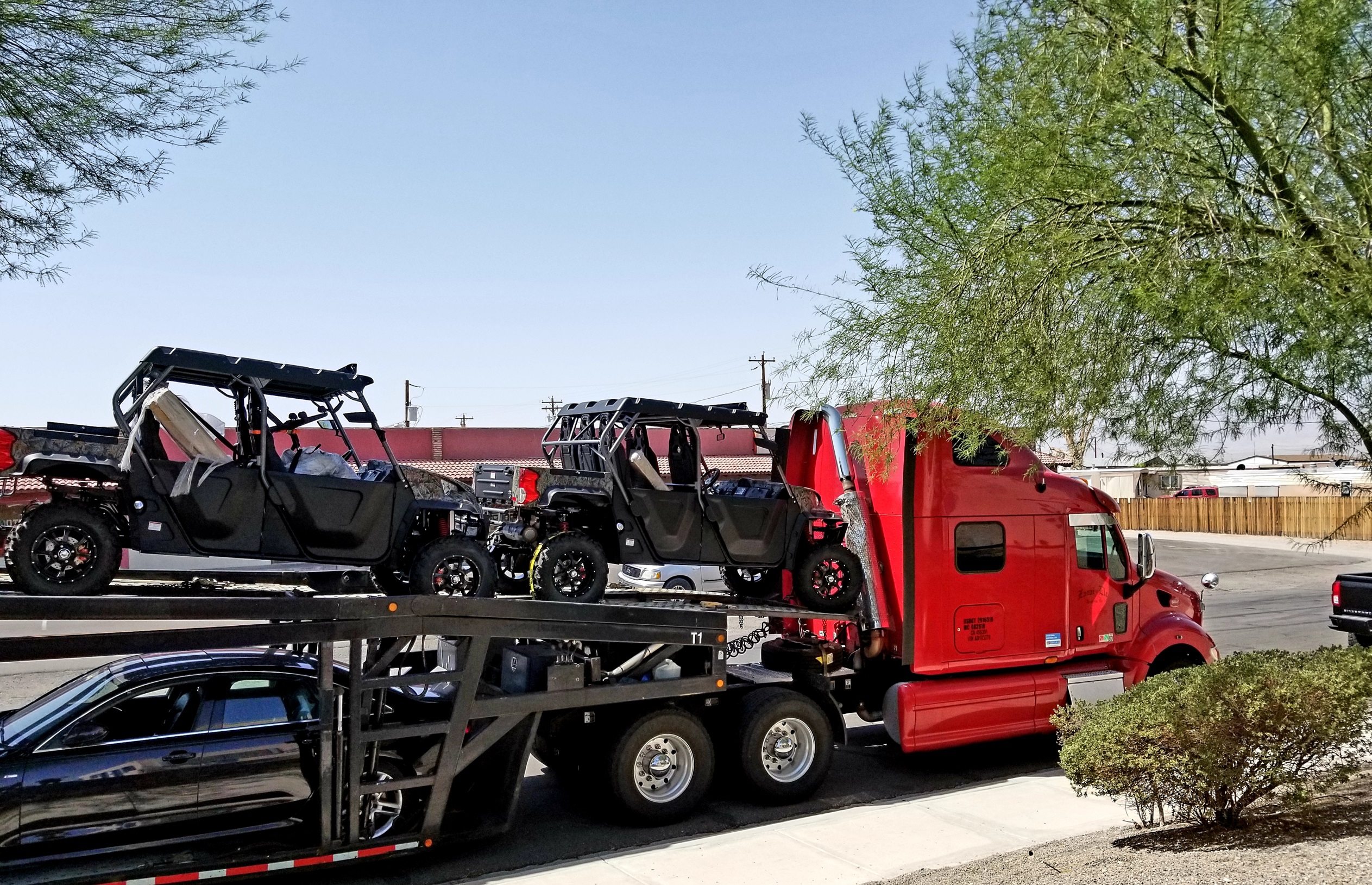 //vetstb.com/wp-content/uploads/2026/08/flatbed-truck-hauling-off-road-vehicles-in-urban-s-2026-07-15-21-36-24-utc-1.jpg